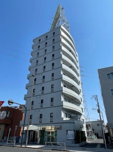 シュロス保木間