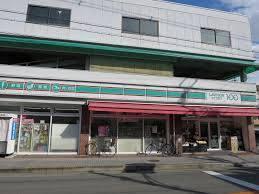 サンフラット茨木(ローソンストア100茨木西田中町店)
