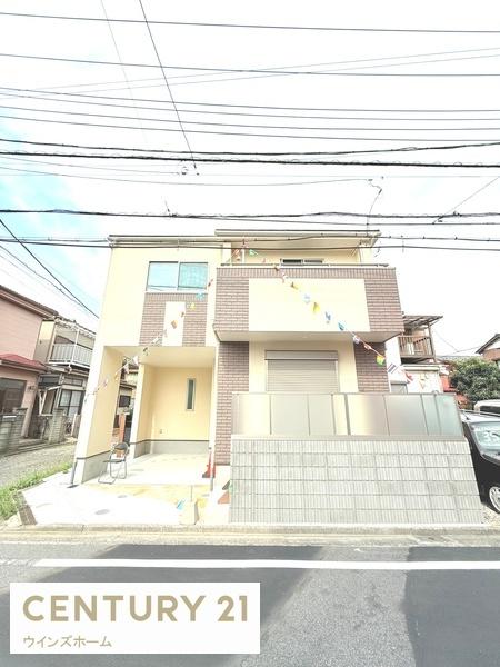 川口市南鳩ヶ谷1丁目1期1号棟(前面道路含む現地写真)
