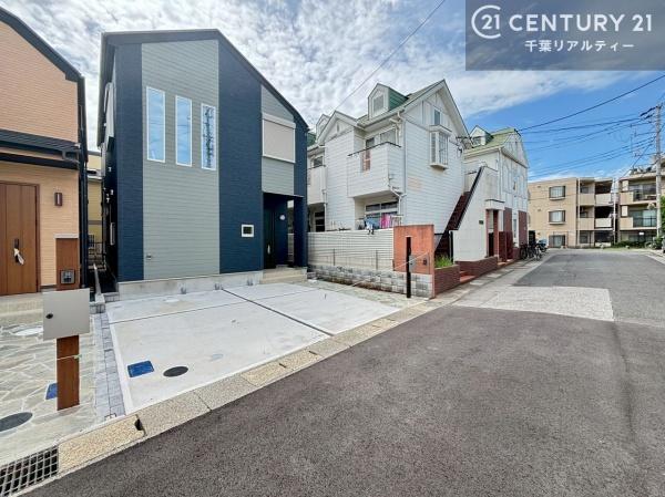 千葉市花見川区朝日ケ丘3丁目 1号棟(前面道路含む現地写真)