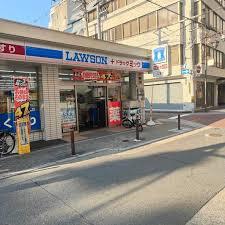 中之島ロイヤルハイツ(ローソン＋ドラッグミック西天満四丁目店)