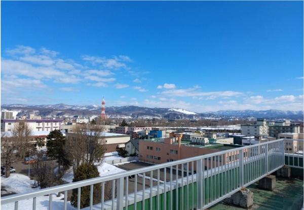 旭川一棟ビルと更地（駐車場）一括売却