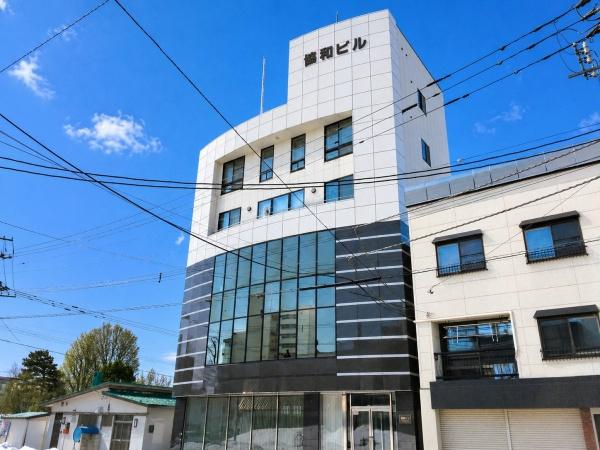 旭川一棟ビルと更地(駐車場)一括売却