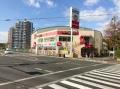 南千里第二コーポラスC棟(スギ薬局南千里店)