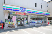 柏サンハイツ4号棟(ローソン・スリーエフ逆井駅前店)