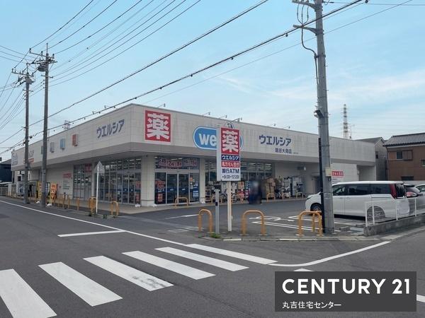 コンフォート嵯峨(ウェルシア越谷大房店)