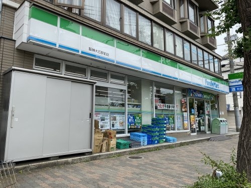三谷川ビル(ファミリーマート阪神大石駅前店)