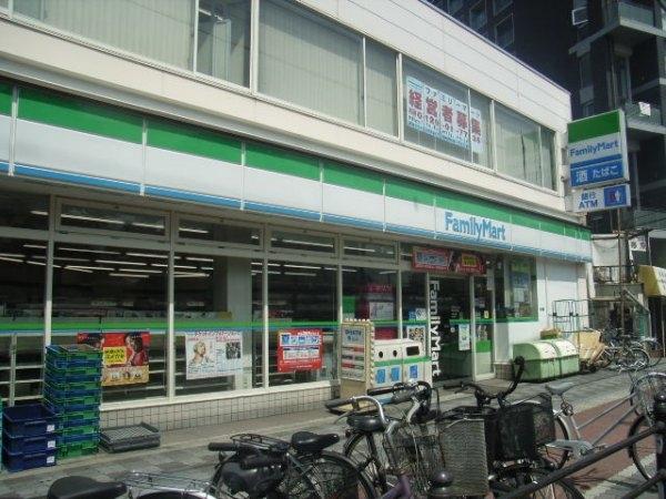 新居マンション(ファミリーマート東淀川駅前店)