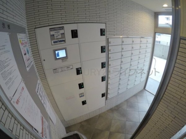 エムディアイジェイ江坂コート