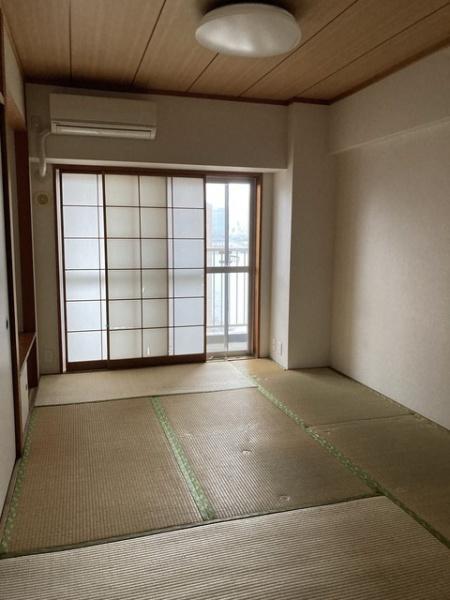 月島ホームズ