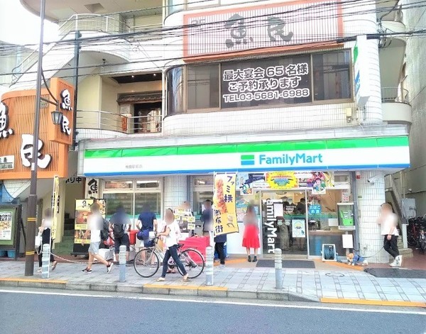 石井サニービル(ファミリーマート梅島駅前店)