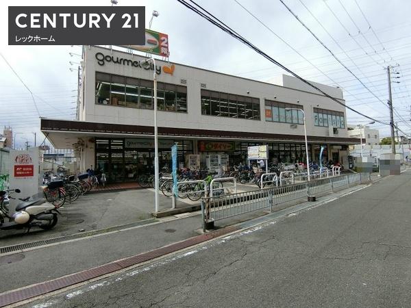 サニーコート(グルメシティ野崎店)