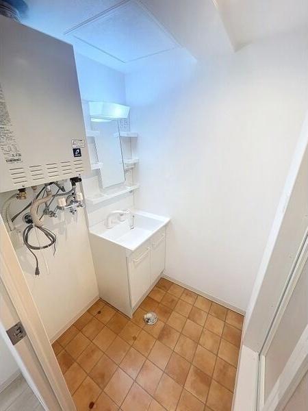 札幌市豊平区月寒西三条9丁目のマンション(洗面台・洗面所)