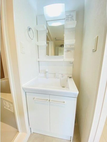 札幌市中央区南十二条西12丁目のマンション(洗面台・洗面所)
