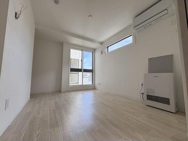 札幌市豊平区豊平四条8丁目のマンション(リビング)