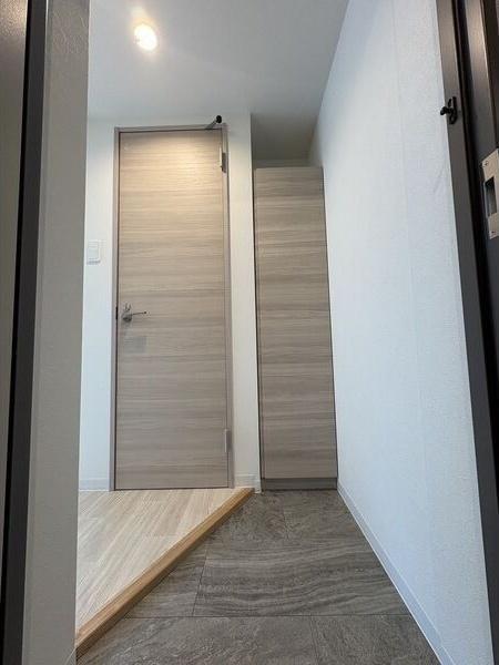 札幌市豊平区豊平四条8丁目のマンション(玄関)