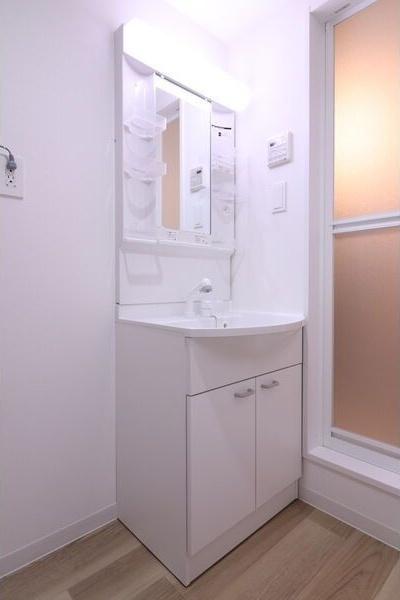 札幌市白石区東札幌四条4丁目のマンション(洗面台・洗面所)