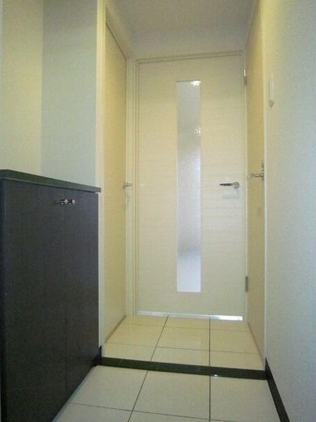 札幌市西区二十四軒四条3丁目のマンション(玄関)