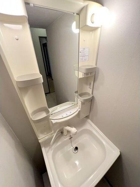 札幌市豊平区平岸五条7丁目のマンション(洗面台・洗面所)