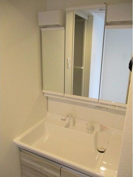 札幌市白石区東札幌二条4丁目のマンション(洗面台・洗面所)