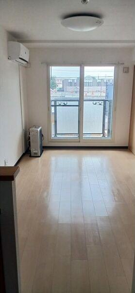 札幌市白石区南郷通21丁目南のマンション(リビング)