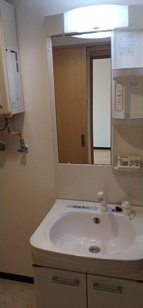 札幌市白石区南郷通21丁目南のマンション(洗面台・洗面所)
