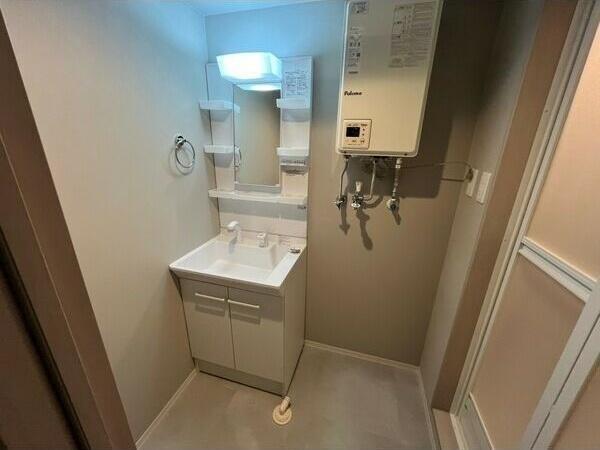 札幌市中央区南十四条西16丁目のマンション(洗面台・洗面所)