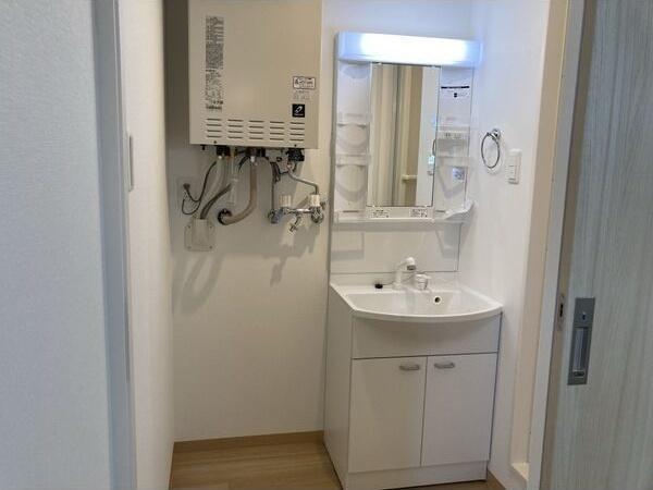 札幌市白石区南郷通14丁目北のマンション(洗面台・洗面所)