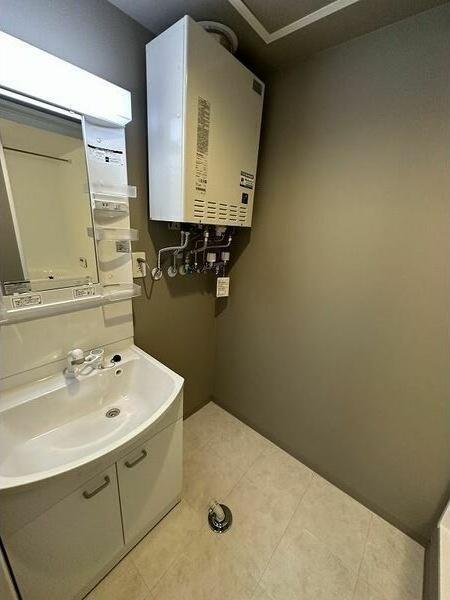 札幌市中央区北十三条西15丁目のマンション(洗面台・洗面所)
