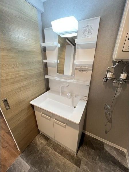 札幌市豊平区美園十一条5丁目のマンション(洗面台・洗面所)