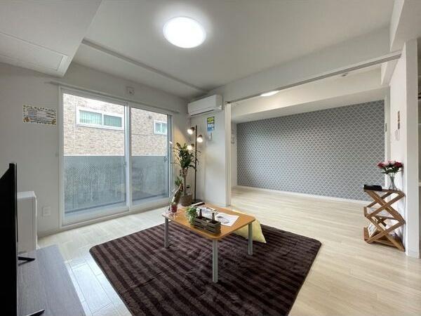 札幌市東区北二十一条東1丁目のマンション(リビング)