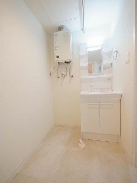 札幌市中央区南十一条西8丁目のマンション(洗面台・洗面所)