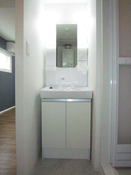 札幌市中央区南十三条西7丁目のマンション(洗面台・洗面所)